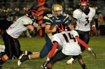 Dos Pueblos won its first Channel League championship in football since 1979, led by quarterback Michael Spiritosanto (pictured here running for a big gain against Rio Mesa) and running back Josh Bartley.