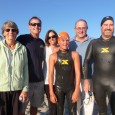 Spencer Woods, center, had the support of his family at Tuesday's Reef and Run Series at East Beach. Spencer , 12, finished third in the 1k swim and his uncle, Neil, right, placed sixth in the 1-mile swim. Rooting from the beach were grandma, Annie; dad, Ian; mom, Sandra, and grandpa,Guy. (Randy Weiss photo)