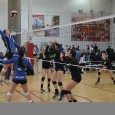 Emma Eccles Emma Eccles of the SBVC 16-Smack goes up for a spike as setter Sara Scarminach looks on.