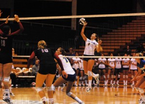 UCSB's Leah Sully pokes the ball across the net
