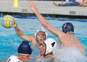Santa Barbara's Ken Myers looks for an opening past Dos Pueblos' Conner Cleary