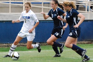 UCSB's Erin Ortega dribbles in front of two Riverside defenders.