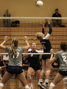 Dos Pueblos setter Paige Craine dishes out a back set as Kelcey Chaffin looks to go up and attack it. (Photos courtesy of Randy Vasquez)