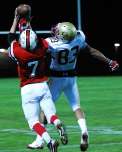 Silas Goma breaks up a pass from Carpinteria quarterback Paul Aguilar to receiver Robert Thornton on Friday