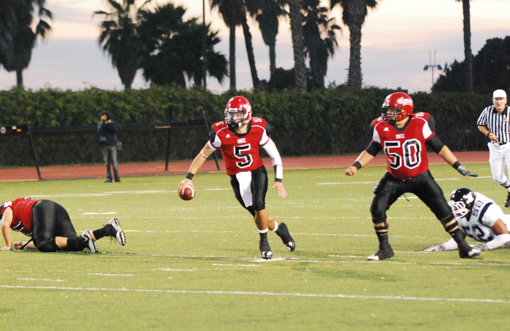 SBCC quarterback John Uribe dislocated his left elbow at the end of  this 17-yard run.