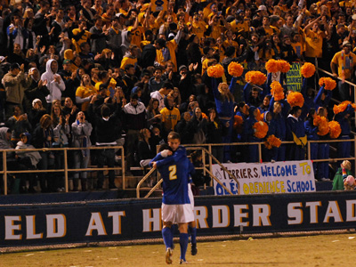 UCSB's Michael Boxall and David Walker, the game-winning goal combination, embrace in front of a packed student section at UCSB's Harder Stadium on Thursday night. 