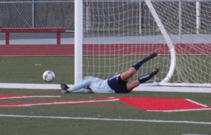 Meagan Bellefeuille saves a penalty kick during the championship match shootout.
