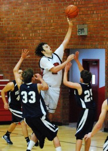 Bishop Diego's Noah Tack goes up for a baby hoo-shot in the second half.