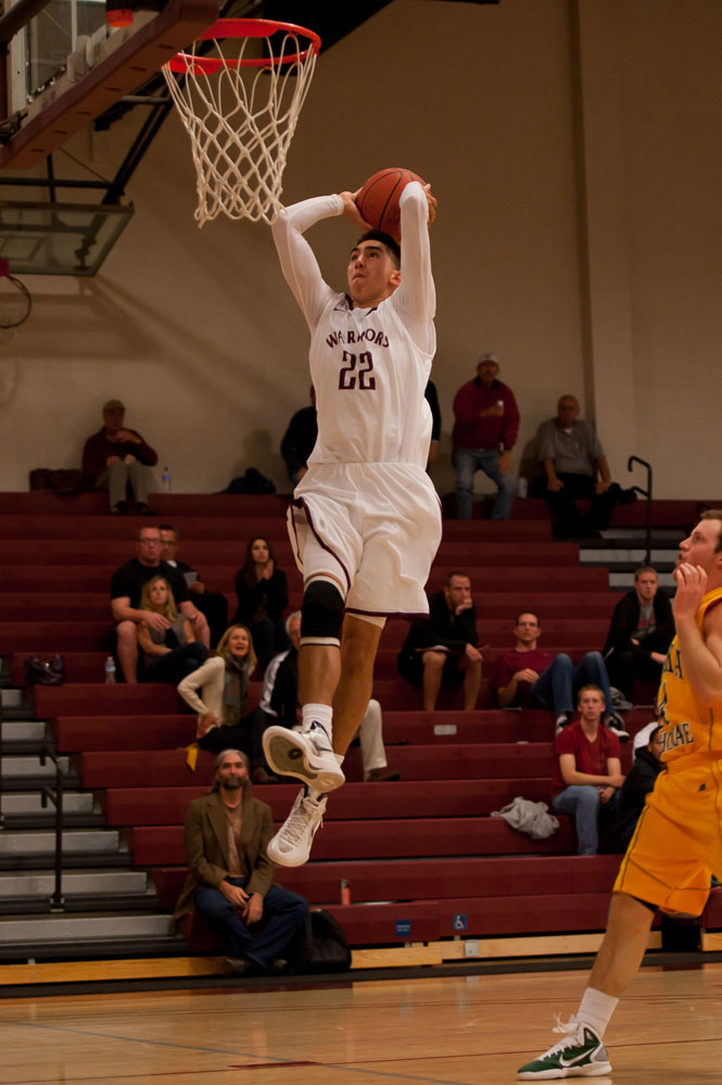 Dave Odell's Westmont athletic department finished 13th this year in the NAIA Director's Cup, the Warriors' best result since 2002. Here Jordan Sachs goes up for a break-away dunk for the Westmont men's basketball team.