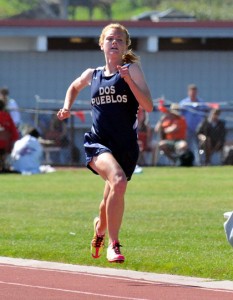 Addi Zerrenner makes her final push to the finish line at the end of her record-breaking race in the 3200 meters.