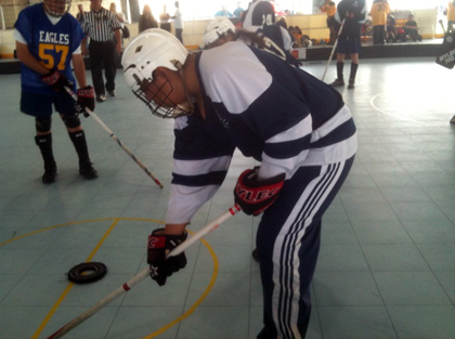 Special Olympics athlete Jose Castrejon demonstrates his Floor Hockey skills.
