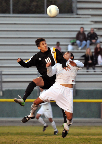 Ventura's Nick Chavira and a Santa Barbara defender battle for the ball during Tuesday night's Channel League opener at Peabody Stadium.