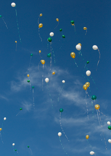 Dozens of balloons were released into the air during the pregame ceremony. (Presidio Sports Photos)