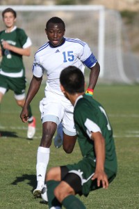 Rams defender and captain Joshua Yaro moves the ball up field against the Knights in the second half.