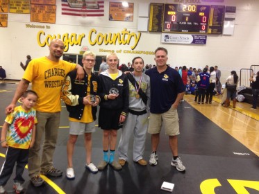 Three Dos Pueblos wrestlers won Channel League titles on Saturday at the league finals. Posing after the tournament are Joseph Lampe, assistant coach Ati Conner, 120-pound champion Chad Lampe, 113-pound champion Cameron Cox,and 126-pound champion Nico Sorenson, and head coach Anthony Califano.
