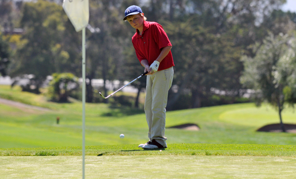 San Marcos' Andrew Rice chips onto the green of the first hole at Montecito Country Club.