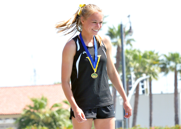 Holly Tokar of Ventura set a meet record in the pole vault with a height 12-4.