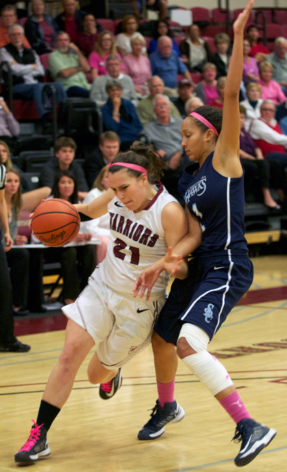 Westmont's Jillian Wilber drives to the basket on Friday and draws a shooting foul. 