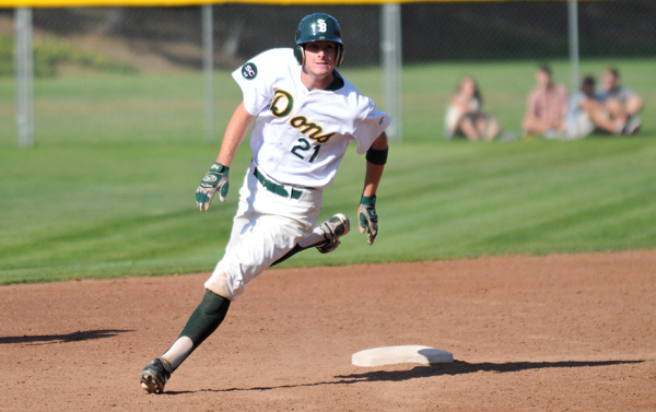 Dons baserunner Michael Day advances to third base on a double by Tyler Newman. (Presidio Sports Photo) 