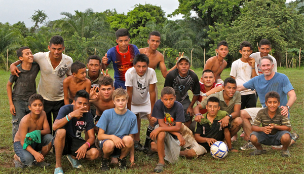 Jake Yanolly with fellow soccer players in Honduras 