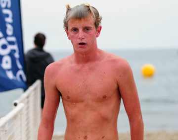 Ben Brewer triumphed in Sunday's 3-Mile Ocean Swim at East Beach.