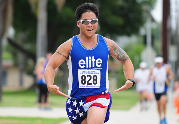 Gabe Wu approaches the finish line in holiday appropriate attire. (Presidio Sports Photos)