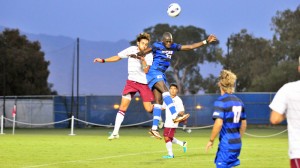 Goffin Boyoko of UCSB battles in the air with Westmont's Muhammad Mehai.