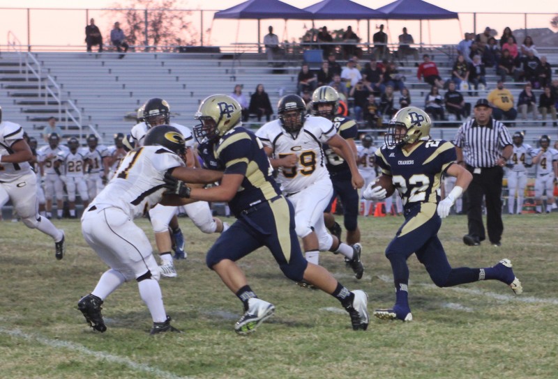 Dos Pueblos running back Tyler Welch runs behind Micah Ruiz during the Chargers' 31-21 victory. Welch scored three touchdowns. (Photo by Katie Issaris)