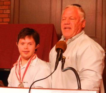 Santa Barbara Special Olympics soccer coach Jerry Siegel introduces the Athlete of the Month, Matt Meisel.