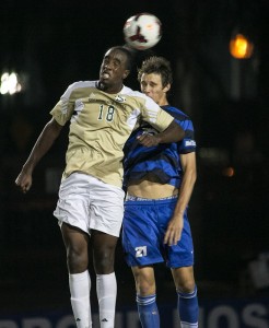 Chimdum Mez gets the jump on Nick DePuy for this header. (Wade Carr)