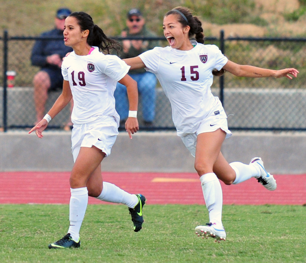 Amanda Diesen chases down teammate Sofia Smati after Smati's game-tying goal in the 78th minute.