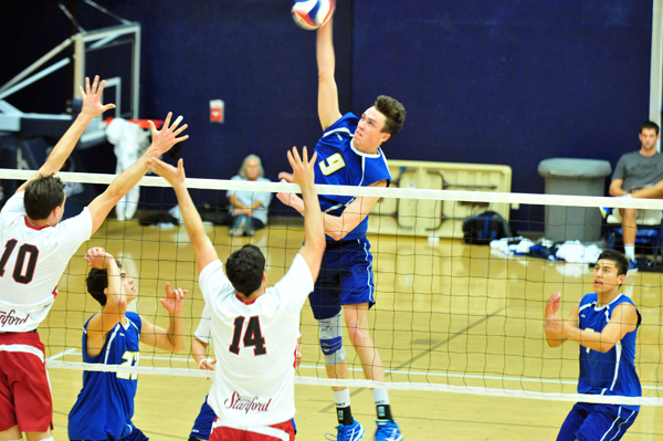 UCSB middle Ryan Thompson hits over the Stanford block during final pool-play match. (Presidio Sports photo)