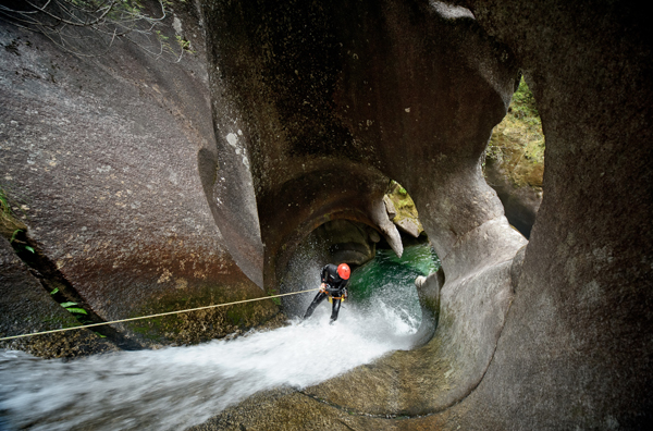Damien Briguet (red helmet and James MacKinnon (white helmet) doing the first recorded descent of Monmouth Creek and Box Canyon near the town of Squamish, B.C. (From the film "Down the Line" / Photo by © Francois-Xavier De Ruydts. 