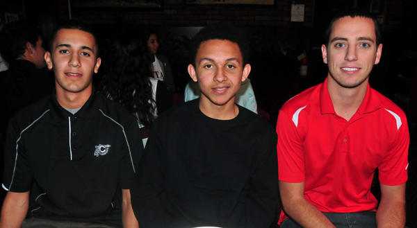 From the Carpinteria High boys basketball team: Athlete of the Week Omar Miranda, Rayshaun Moore, and head coach Johnny Ward