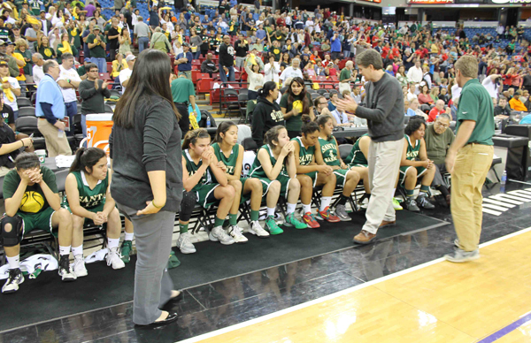 Coach Andrew Butcher applauds the effort of his team in Friday’s CIF State Division 3 Final at Sleep Train Arena in Sacramento. 