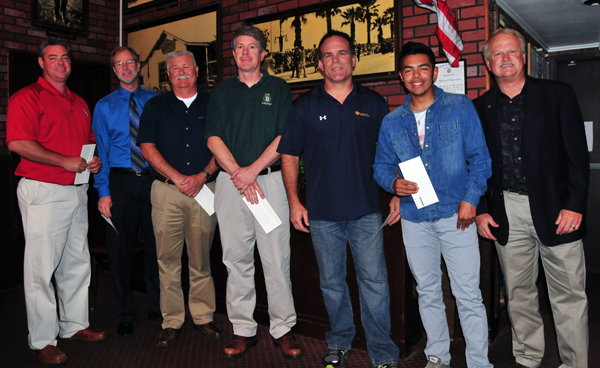 Six coaches were recognized as Coaches of the Year. They are, from left, 