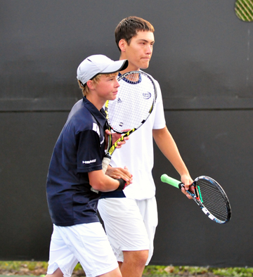 Miles Baldwin and Patrick Corpuz shake hands following match point on Thursday.