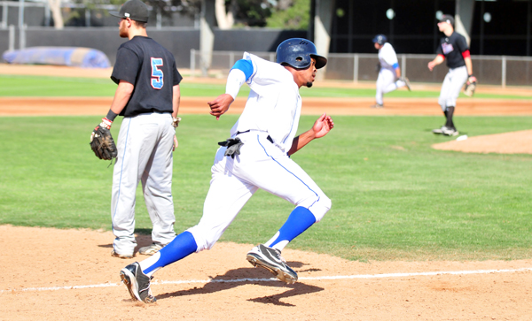Santa Barbara's Jaylin Davis rounds third base on his way to scoring the Foresters' first run of the summer.
