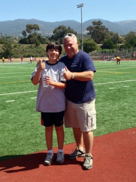 Jerry with track athlete Ben Medina