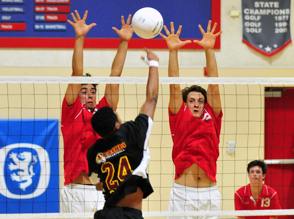 Christian Widmer, left, Taylor Mann, right, and the Royals enjoyed a significant size advantage over Arcadia.