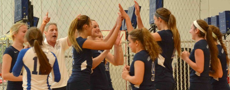 The Santa Barbara Volleyball Club's 15-Blue team celebrates after going unbeaten in pool play in its final tournament of the regular season.