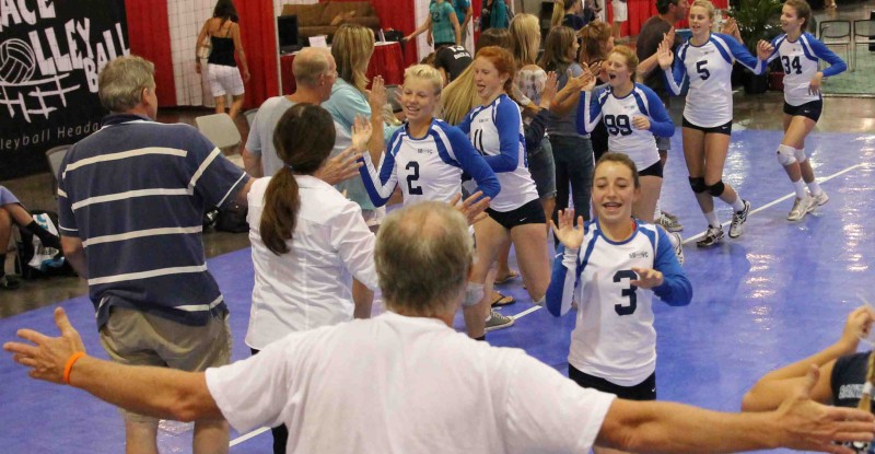 The 13-Blue team of the Santa Barbara Volleyball Club does a victory lap at the Volleyball Festival in Phoenix, Ariz.