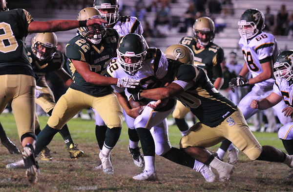 The Dons had a tough time trying to bring down Royal running back River Meza.