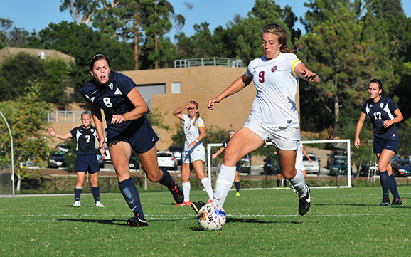 Westmont's Kaci Mexico takes her final touch before scoring for Westmont.