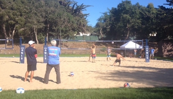 Laguna Blanca sand volleyball coaches Dillan Bennett and Mike Maas watch the action on the school's sand courts.