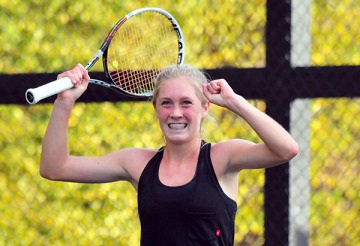 Caisey Lee Emery reacts to winning the singles championship.