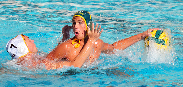 Santa Barbara's Sawyer Rhodes is blanketed by Ventura's Tyler Gray in Thursday's Channel League match. (Presidio Sports Photo)