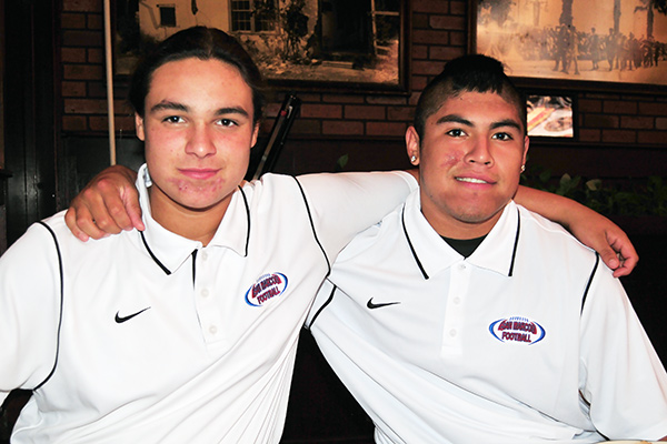 San Marcos football teammates Paul Galarte, left, and Ivan Reyes, right. 