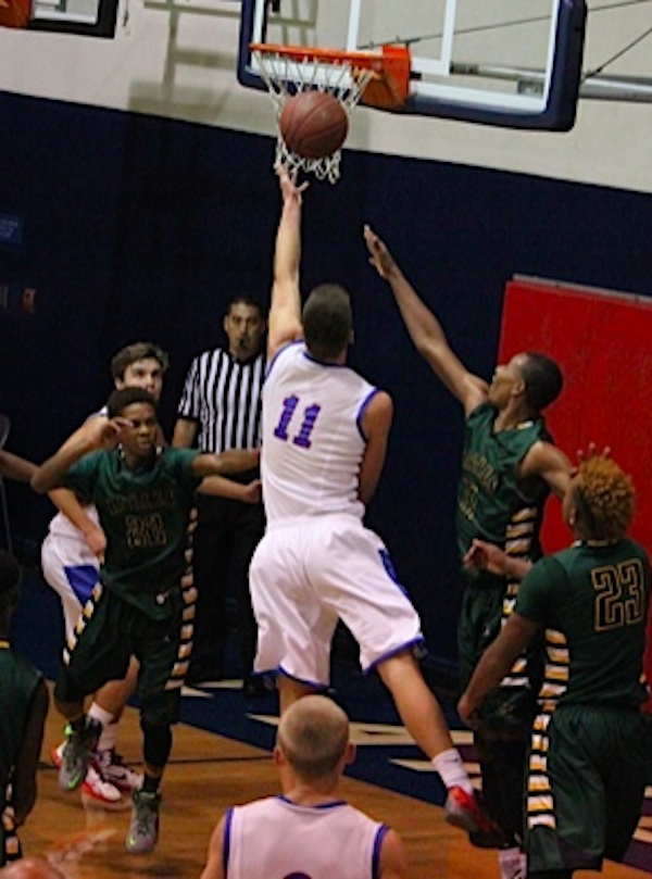 Scott Everman drives to the basket during San Marcos' win over Eisenhower in the D-1-Bound Classic.
