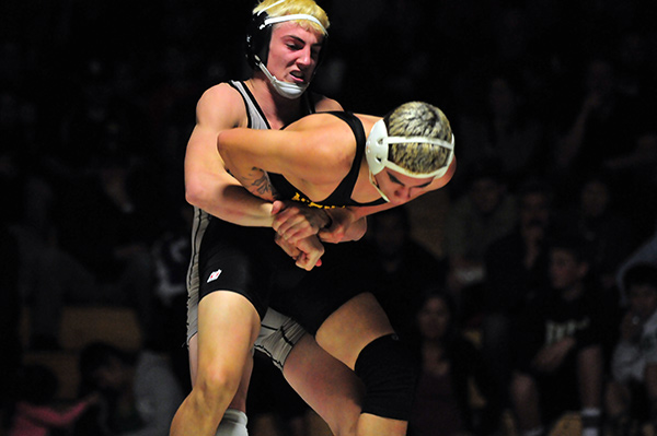 Cameron Cox of DP puts the squeeze on Ventura's Rudy Medina. Cox won the bout by pin. (Presidio Sports photo)